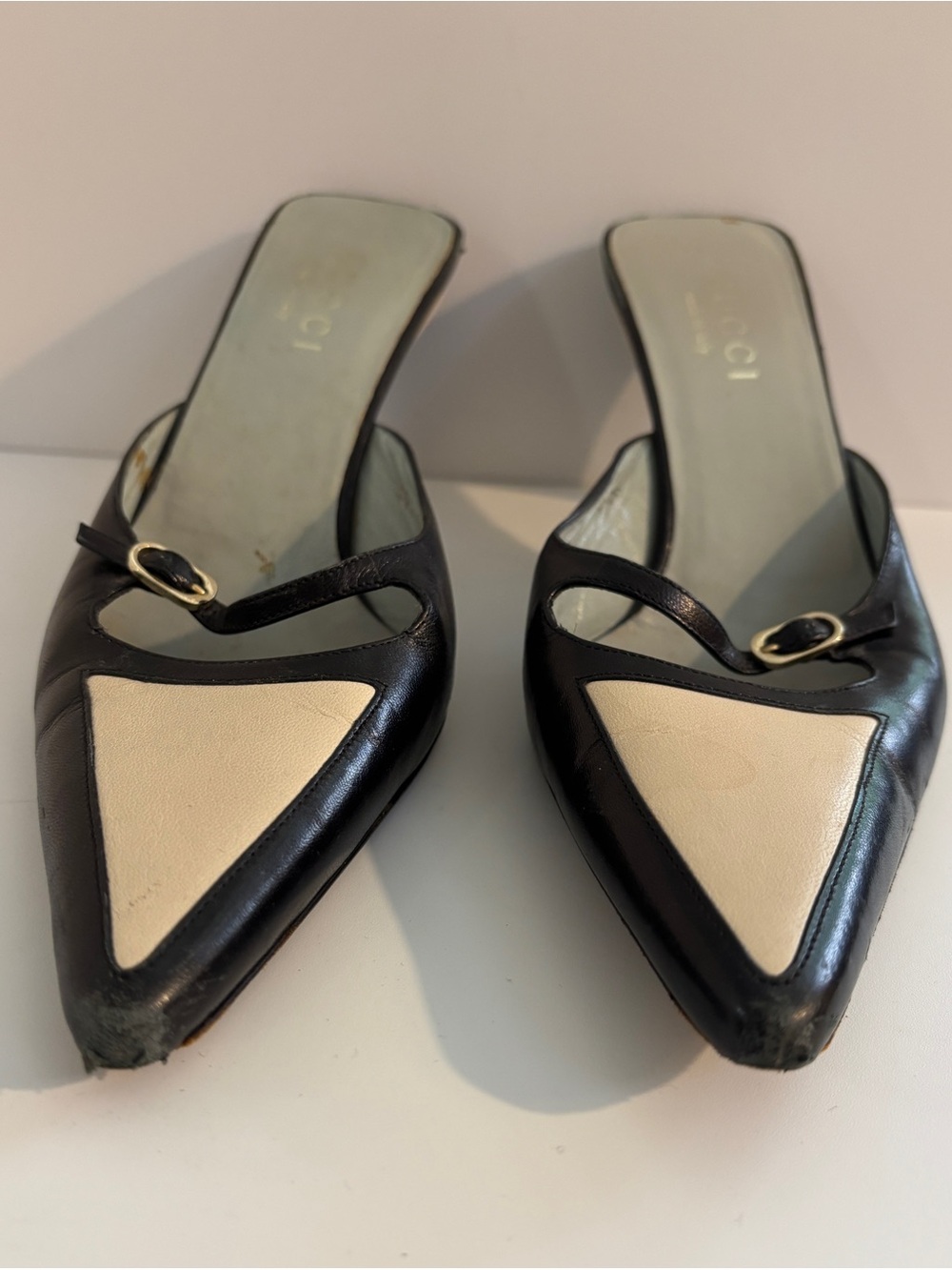 Gucci Black and Cream Pointed Leather Mule Heels with Gold Buckles